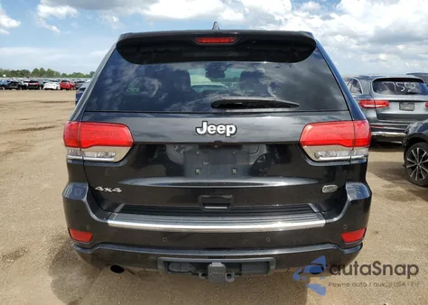 2014 Jeep Grand Cherokee Overland из США, поврежденный, VIN 1C4RJFCG1EC129953